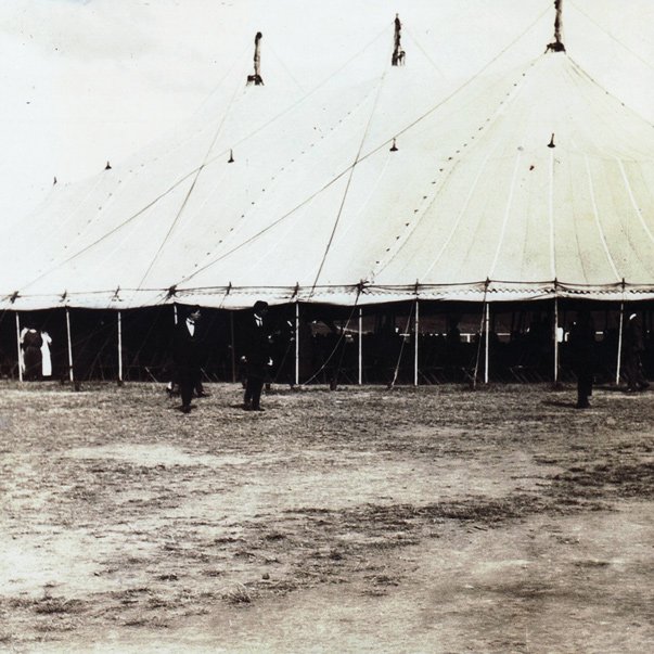 Black and white archive image of large meeting tents. Pavilions Blackburn Lake is built on a historic site owned by the Seventh Day Adventist Church.