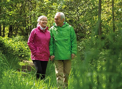 Senior couple walking. Enjoy the natural environment with Blackburn Lake Sanctuary across the road and many parks nearby